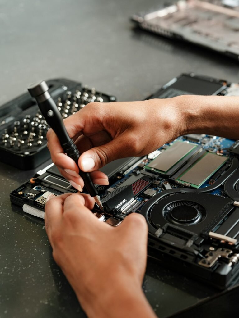 Laptop opened up for component service